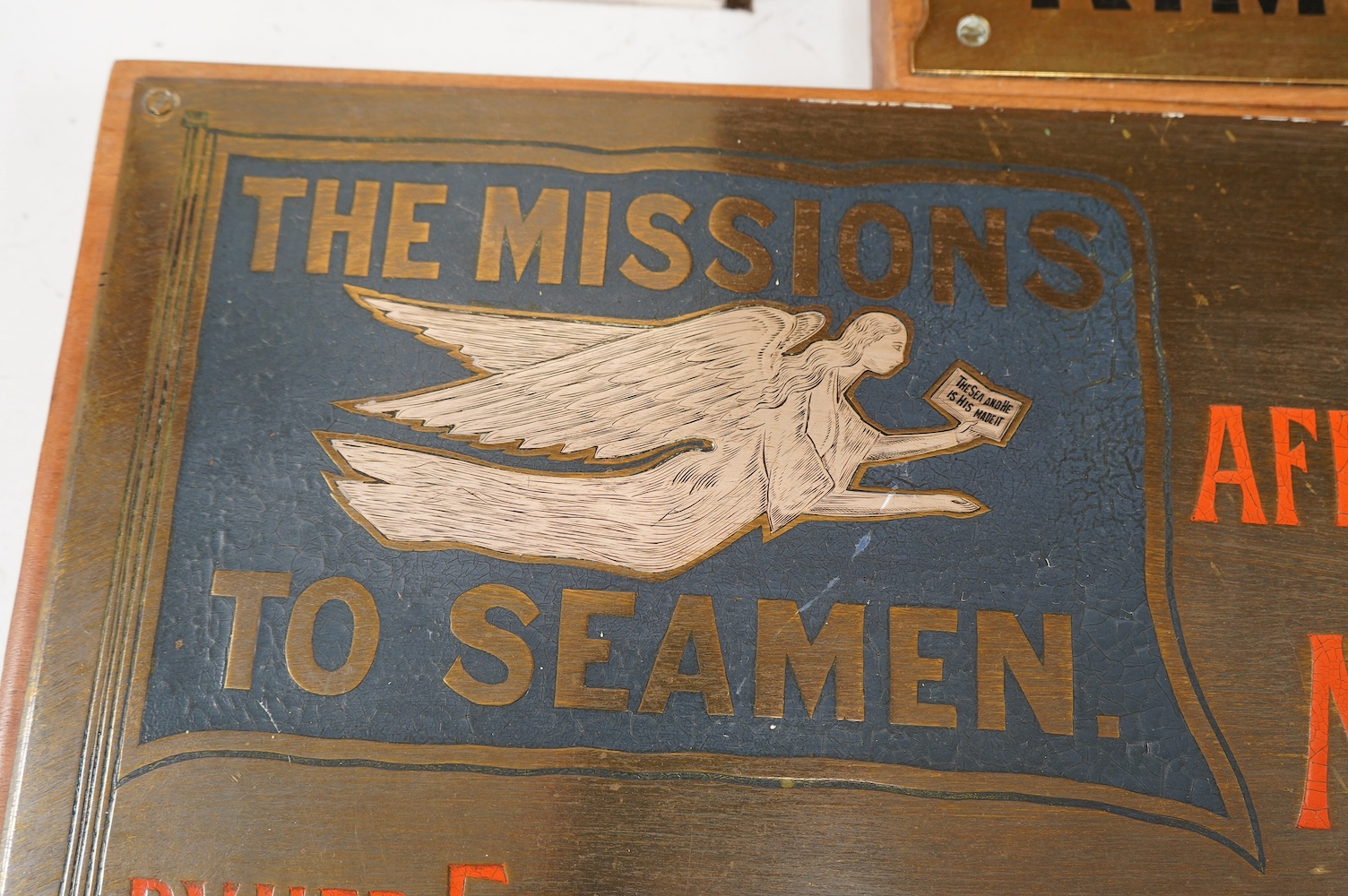 A brass plaque for a tribute of remembrance to Millicent Ormsby the missions to the seamen, Dublin, 1923, engraved by C Franklin and another for RMS Leinster. Condition - fair